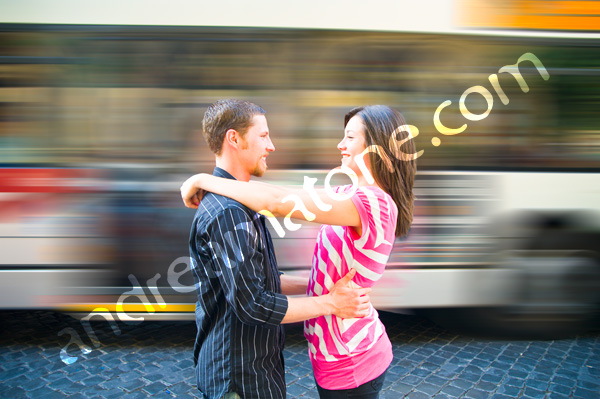 Coulpe holding eachother during a photo tour in rome italy Photo Tour Picture in Rome: romantic Coulpe holding eachother with bus motion blur