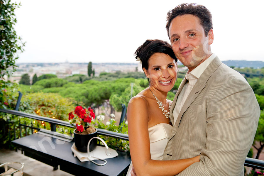 wedding-rome-035 Husband and wife together before the city of Rome