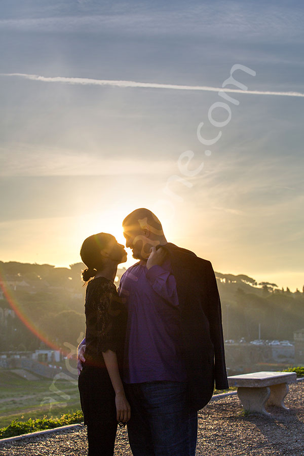 surprise-proposal-21012-005 Engagement session kissing in the sunset. Silhouette version.