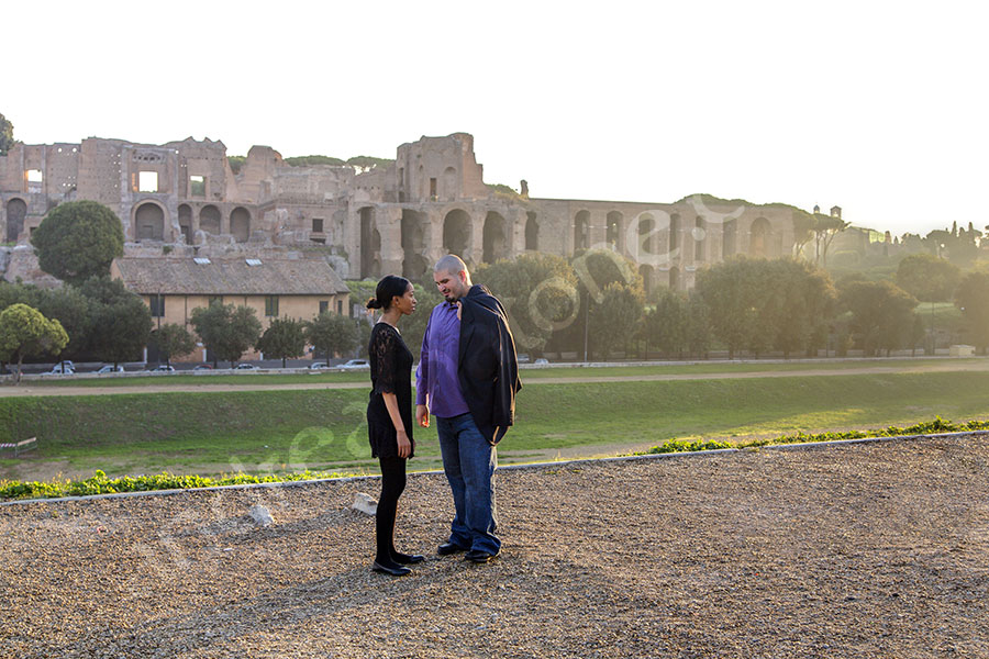 surprise-proposal-21012-007 Couple standing on top of Circo Massimo in the roman city.