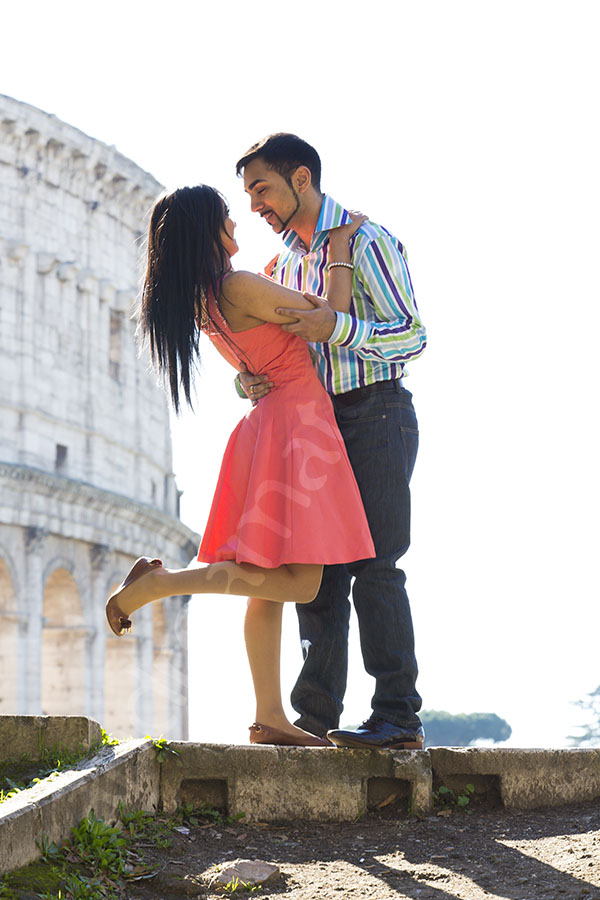 Couple in front of the Roman Colosseum