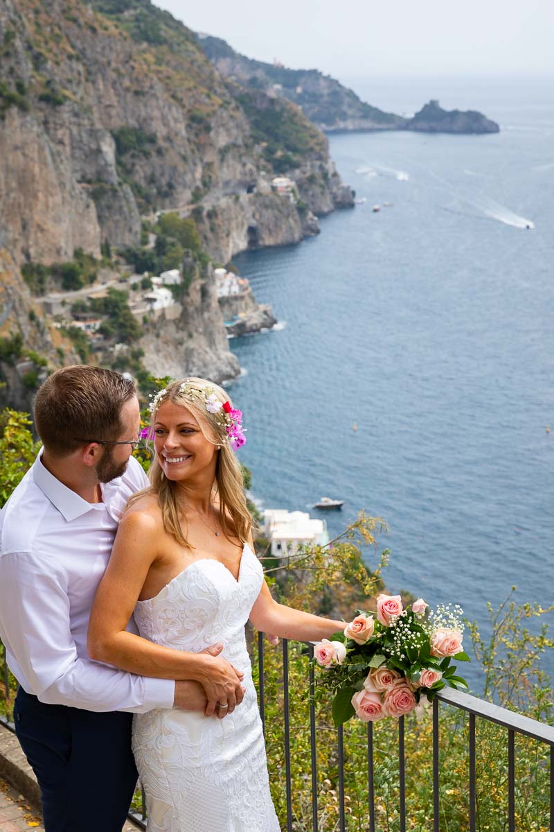 Bride and groom together portrait after getting married on the coast of Amalfi