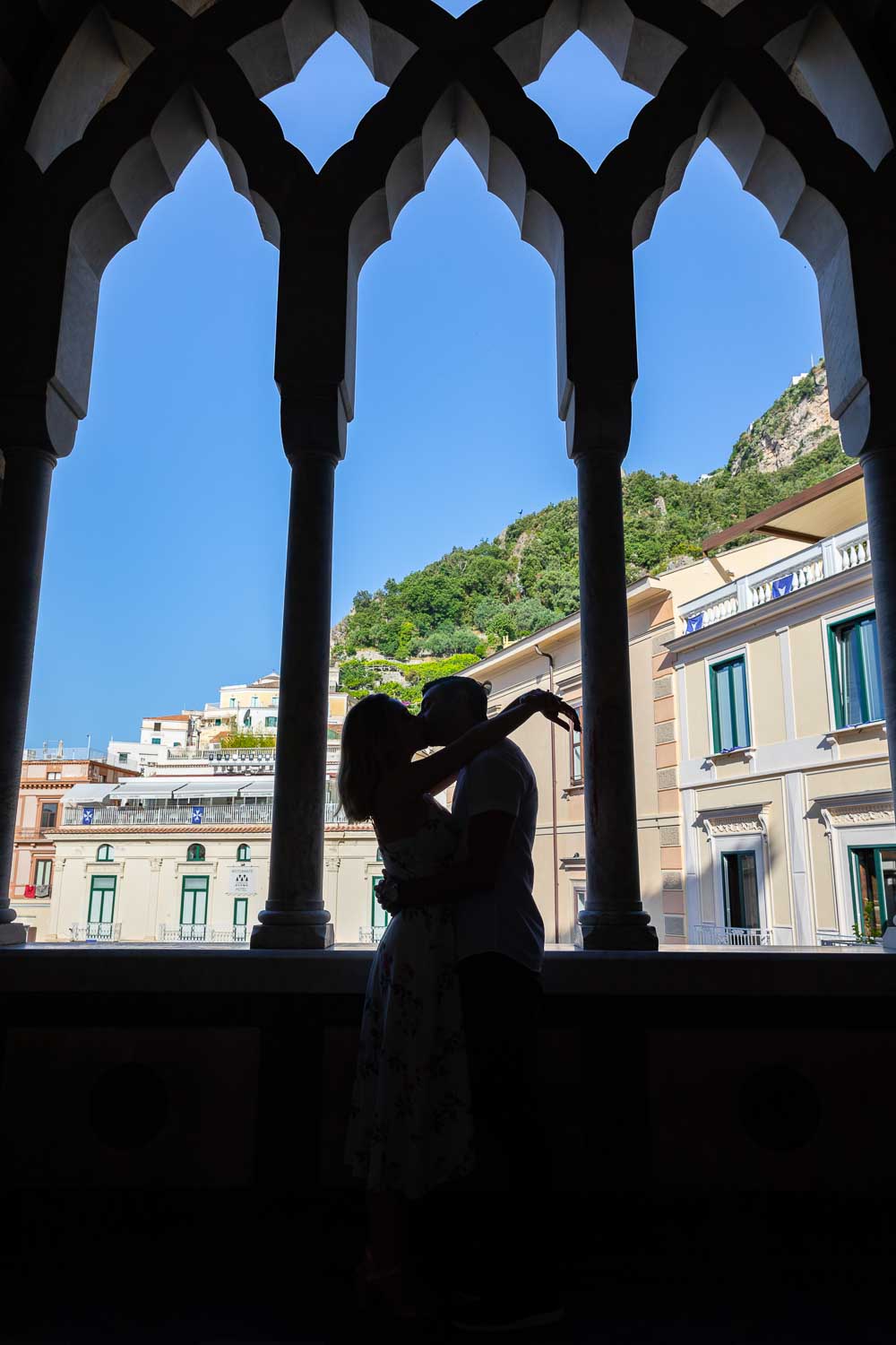 Silhouette image of a couple together in love at the Duomo