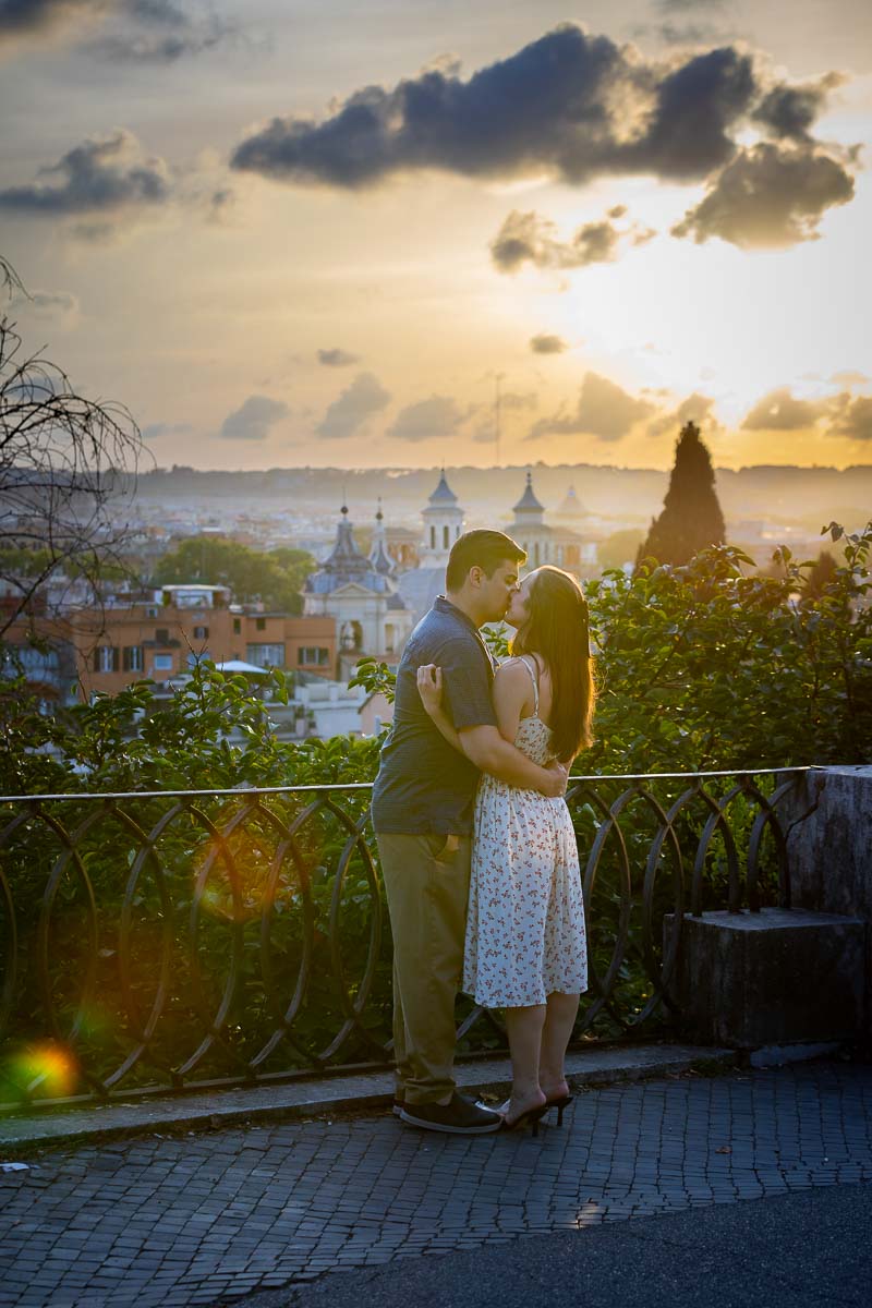 The she said yes moment kissed by the setting sun over the city of Rome Italy