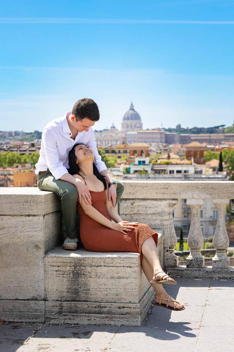 Looking at each other on the pincio park terrace panoramic outlook while being the subject of photography