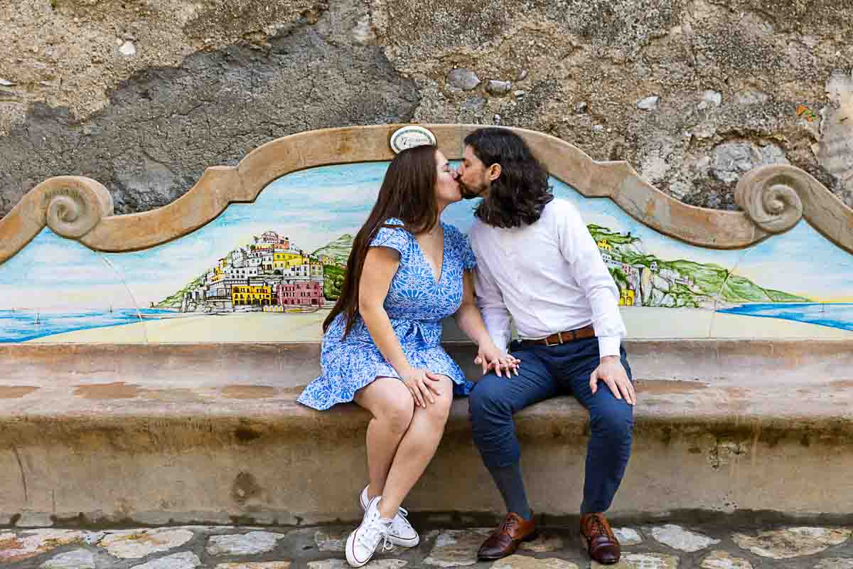 Couple kissing during a photoshoot in southern Italy 