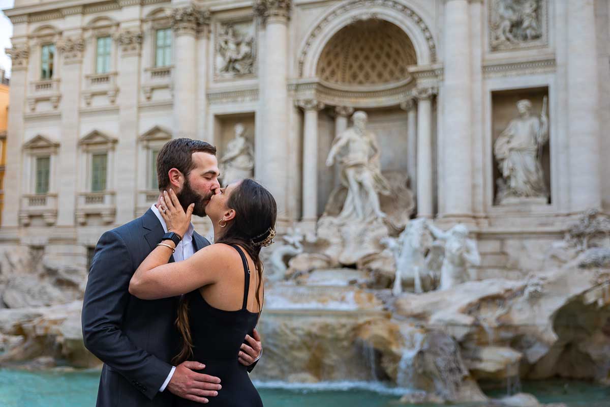 Engagement couple kissing