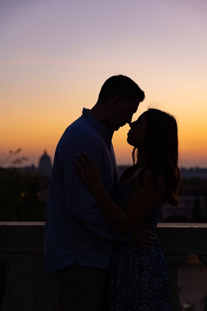 Silhouette image of couple in Love at sunset