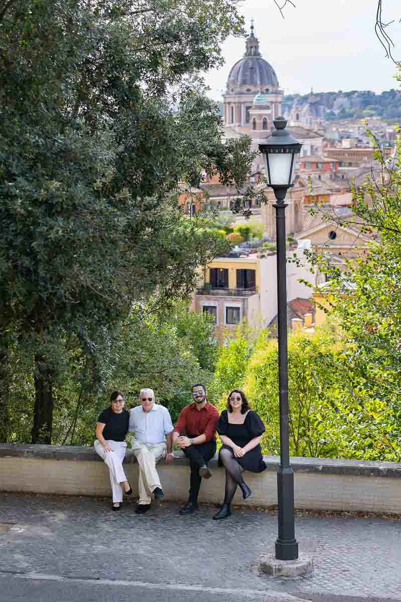Group picture frame from above looking below over the roman skyline
