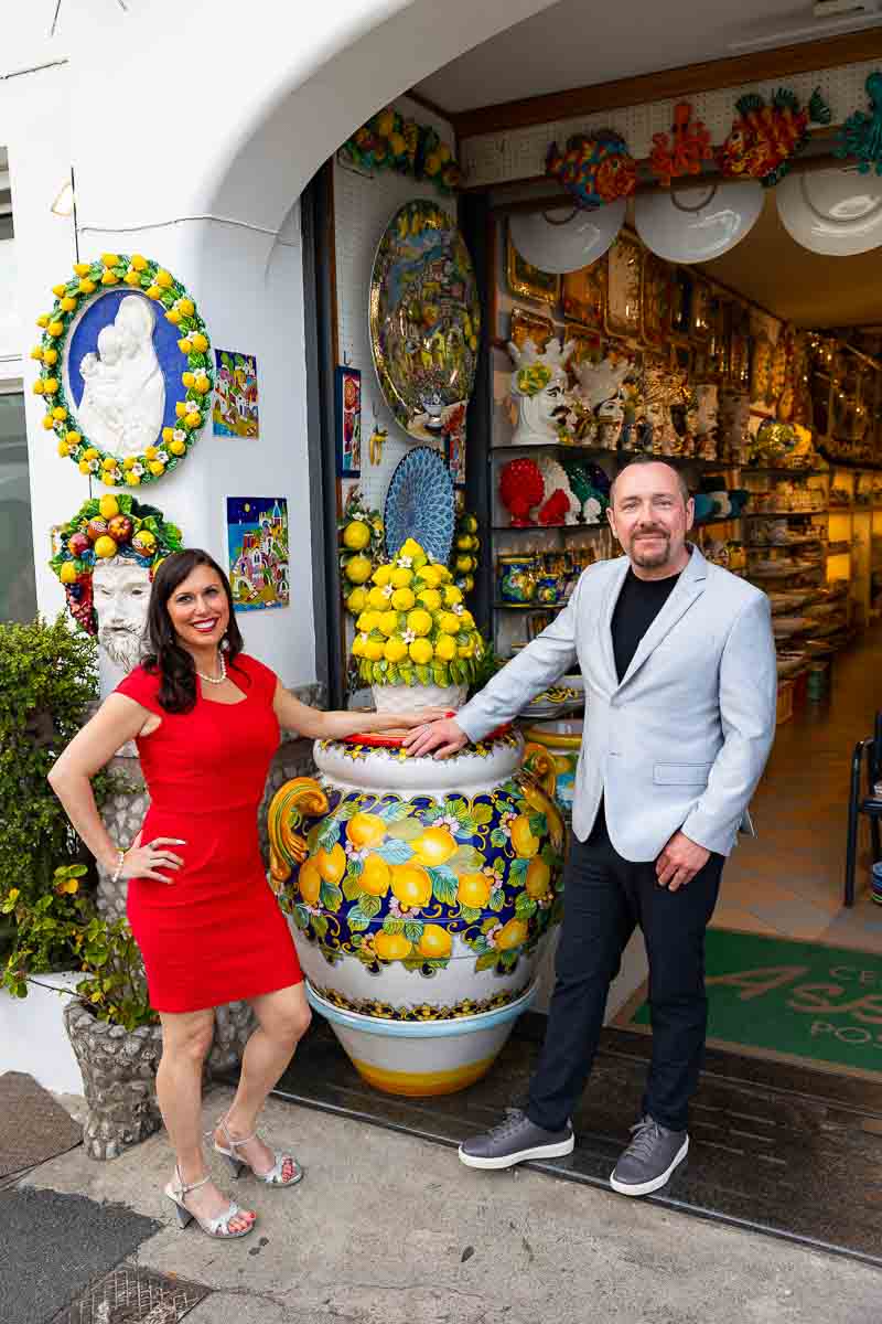 Taking photos next to a large ceramic vase lemon inspired