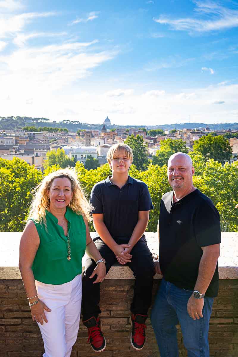 Posed for a portrait picture in front of the roman skyline 