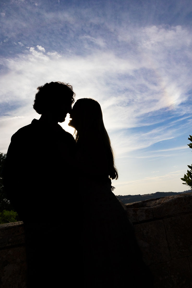 Silhouette photography of a couple kissing