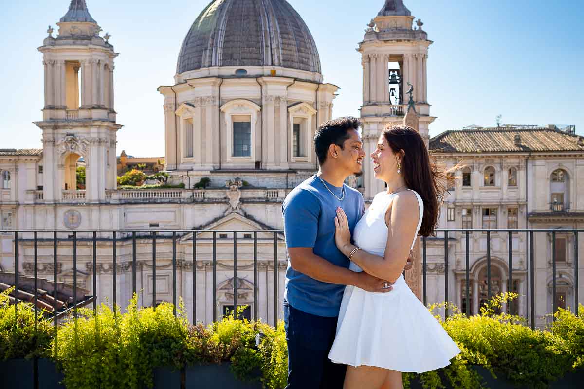 Posed couple together while looking at each other in love