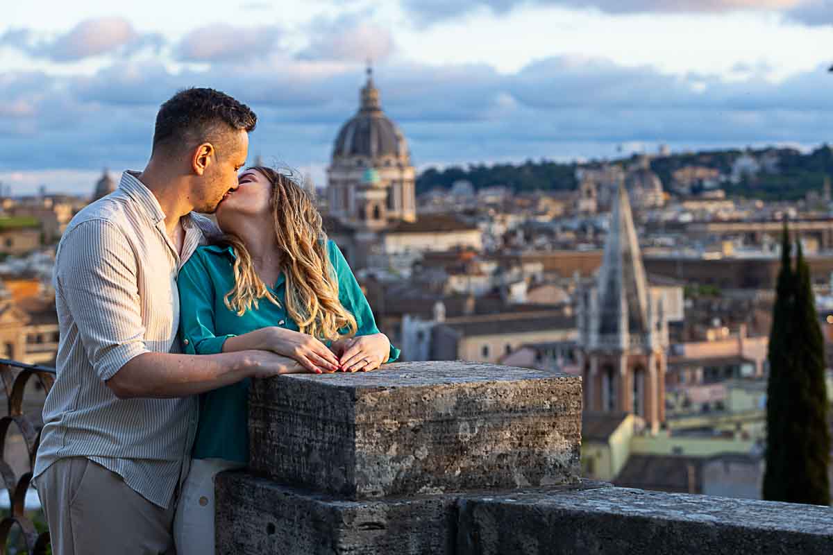 Engagement photos taken at sun down overlooking the Eternal city from the above Pincio terrace outlook