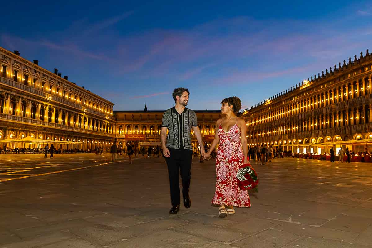 Walking together during a photoshoot in Piazza San Marco square 