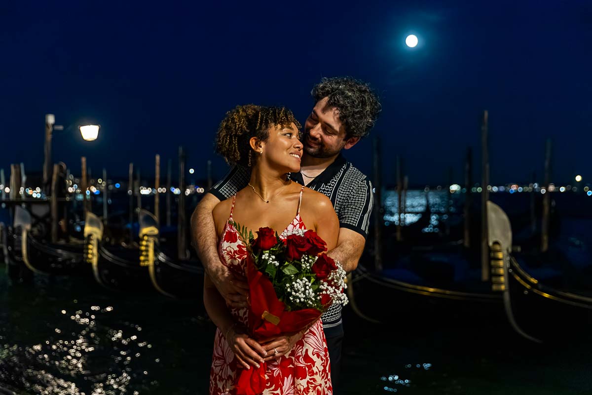 Portrait engagement holding each other during a photography session Venezia Italy 