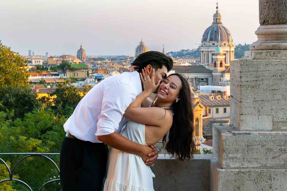 Close-up portrait picture happy engagement with the city in the background